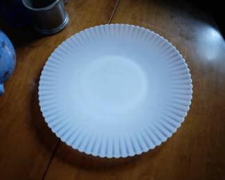 Crinkled white decorative plate.