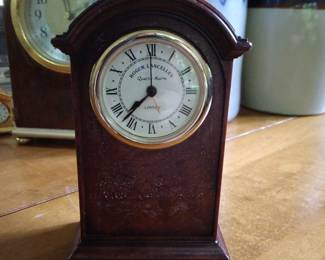 Small wood shelf clock decor.