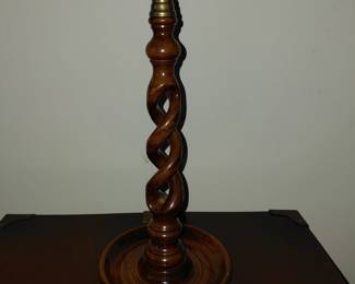 Corkscrew candle with gold top detailing.