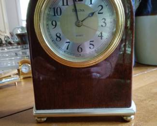 Medium wood shelf clock.