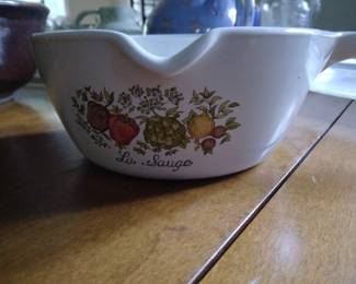 Serving bowl with spout and handle.