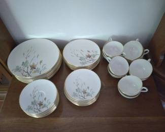 Leaf pattern china with gold edging. 8 dinner plates, 8 medium plates, 8 small plates, 12 saucers, 12 tea cups.