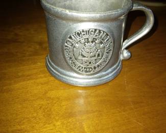 Metal WMU cup with handle.
