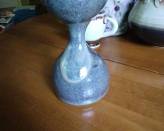 Hourglass shaped table decor, pottery.
