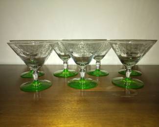 Small ornate glassware. Pattern on top and green bottom-stem. Set of 7.