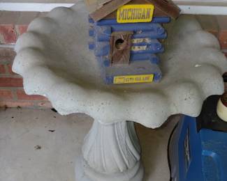 Cement bird bath, comes in 2 pieces.