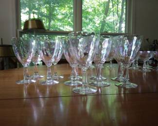 Iridescent glass ware. 10 short wine glasses, 6 small sipping glasses, and 11 tall wine glasses.