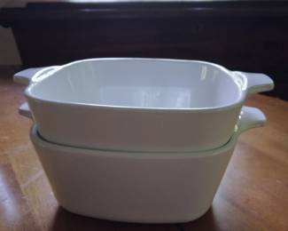 Pair of handled white baking bowl.