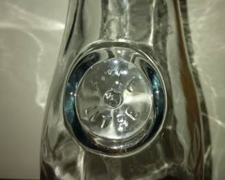 Mark/label on glass decanter.