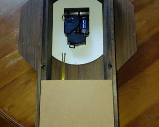 Back of fancy wall clock, runs on battery.