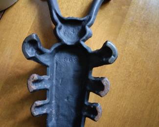 Bottom of cast iron bug.