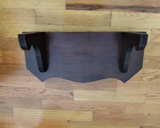 Bottom of wall shelf.