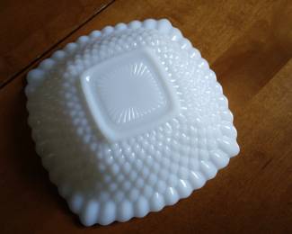 Bottom of milk glass bowl.