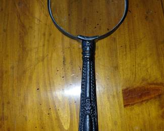 Magnifying glass.