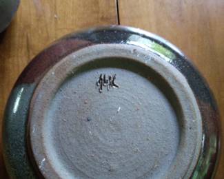 Bottom of two toned pottery bowl.