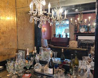 Many wonderful vintage and collectible bar items. Sets of glasses, carafes, hand painted items and other