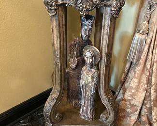 Carved religious santos