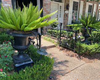 Pair of antique urns from their Pelham Street home