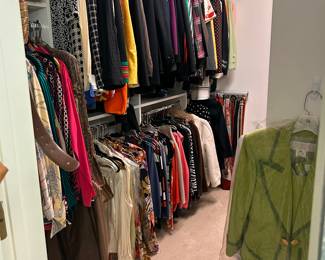 Several closets with ladies vintage, designer clothing, many purses and belts silk scarves nice costume jewelry and more
