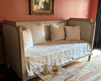 Tara Shaw daybed and French marble top drink table