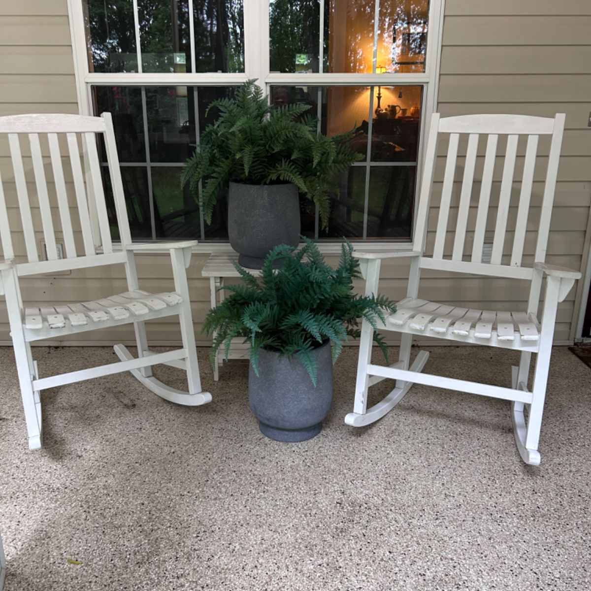 Porch rocking chairs, large faux fern planters