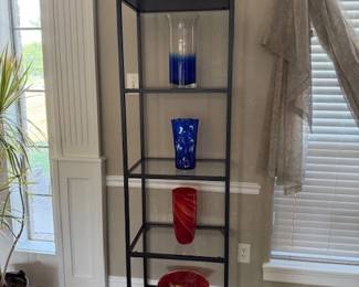 Hand blown glass from around the world and the metal and glass shelves (buy this whole set up and you have your statement piece)