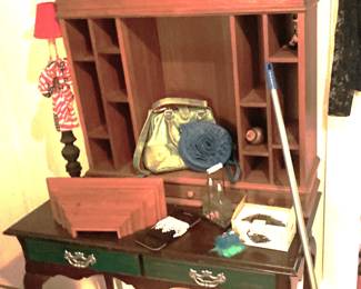 Mahogany writing desk, oak pigeon-hole shelving. 