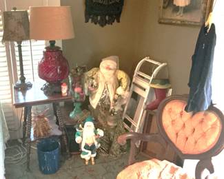 Oak side table, lamps, antique upholstered side chair and Santa collectables.