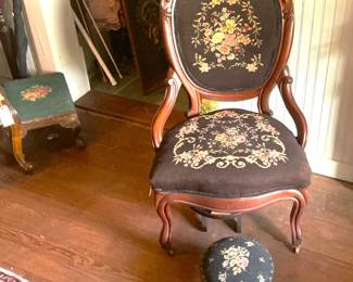 Antique needlepoint armchair and footstool.