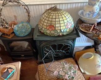 Fireplace insert, hanging Tiffany lamp, bowl and pitcher.