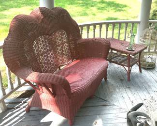 Wicker settee and table.
