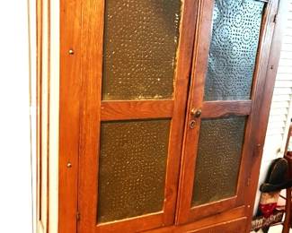 Oak pie safe with pierced panel doors.