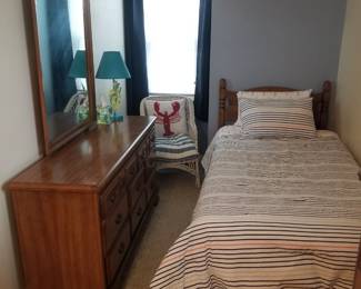 Dresser with mirror; twin bed