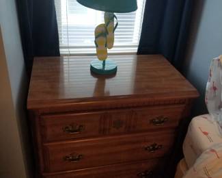 Nightstand; table lamp