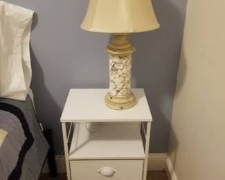 Nightstands feature charging stations; set of two table lamps