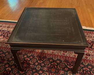 Black side table with leather top. We have 2 of these