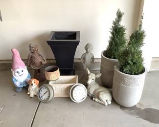 A variety of yard decor items including a cement gnome H 23", (2) cement planters (one is significantly cracked on one side) H 18" x 12" diameter and more. See photos for sampling.