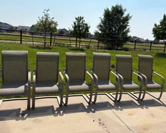 Set of (6) metal patio chairs with mesh seat and back. Mesh is in good condition. Some rust and peeling paint on arms. H 45" x w 23" x D 23".