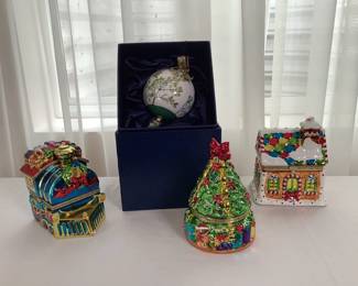 Three glossy finish music boxes including a gingerbread house, a train and a Christmas tree. All work well. The Smithsonian Collection mistletoe "Kissing Ball", new in box.