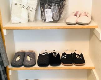 Nine (9) pairs of new women's slippers ranging in size from 7 1/2 to 8. Brands include LL Bean, Skechers, Deerform, Total Support and more. See photos for sampling.