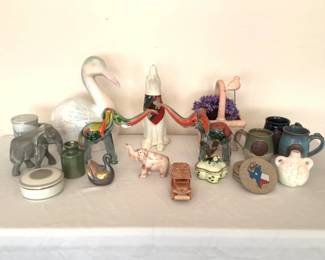 Two (2) art glass elephants, H 7", ear is chipped off on one elephant. Heritage House, Inc. 'Love is a Many Splendored Thing' music box. Mikasa trinket dish with lid, and other figurines. See photos for details.
