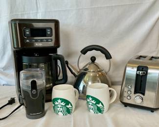 Kitchen essentials which include a Mr. Coffee (12) cup drip coffee maker, a Knapp Monarch toaster, a Hamilton Beach fresh grind coffee grinder and a stainless steel tea kettle. All electrical items power on.