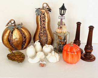 Fall home decor includes: metal gourd & pumpkin, wood candlesticks, H 11 1/2", ceramic white fall fruit, & more. See photos for sampling.