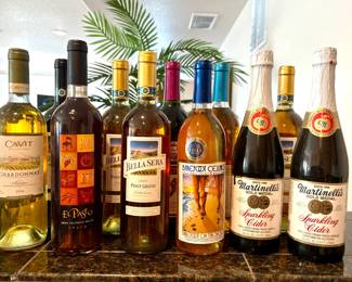 Nine (9) sealed bottles of wine including varieties of Bella Sera, Barefoot, El Paseo, and Cavit. Two (2) sealed bottles of Martinelli's sparkling cider.
Must be 21, and show ID at pick up. May not be sold for resale.