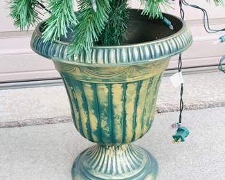Pair of faux Christmas trees in plastic pots. One of the pots is broken along the seam. H 48"