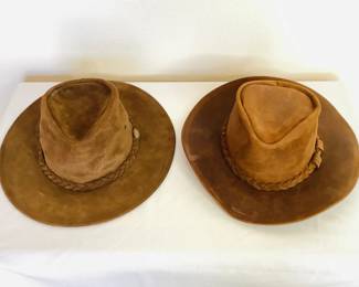 New with tags Minnetonka "Outback" oiled leather hat. Appears to be womens. Size large. New with tags Henschel Hat Company 'The Crusher Weekend" leather hat, size xl. Appears to be womens.