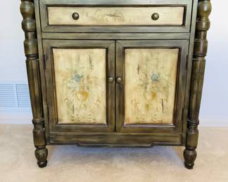 Stein World accent table featuring a floral distressed design. H 32 1/2" x W 31" x D 18". Minor nicks and scratches.