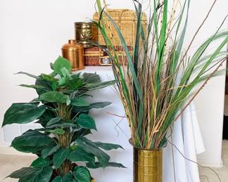 Home accents including a faux plant with faux bamboo planter, decorative reeds in a brass container H 19", decorative baskets, and a floral rug H 30" x W 47" and more