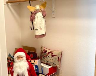 A large assortment of Christmas decor items including several standing santas ranging in size from H 12" to H 36", (3) boxes of Christmas ornaments and much more. See photos for sampling.