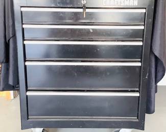 Craftsman (5) drawer rolling tool storage cabinet. H 34" x W 27" x D 18". Contents INCLUDED. Various tools in drawers include a partial set of Hyper Touch screwdrivers, a Black and Decker variable speed drill (untested), a Sears Craftsman 1/4" electric drill and more. See photos for sampling. Key included.